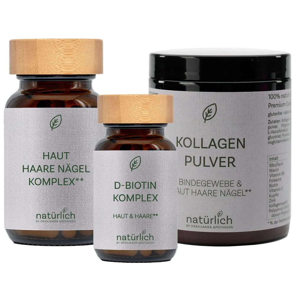 Drei Nahrungsergänzungsmittel von natürlich by Dräxlmaier Apotheken: Haut Haare Nägel Komplex, D-Biotin Komplex in braunen Dosen und Kollagen Pulver in schwarzer Dose, alle mit silbernem Etikett nebeneinander
